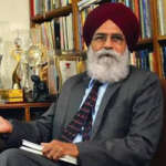 Dr. Surjit Patar